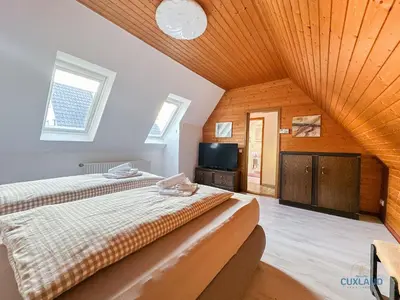 Ein Bett oder Betten in einem Zimmer der Unterkunft Ferienwohnung Uttied