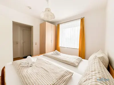 Ein Bett oder Betten in einem Zimmer der Unterkunft Haus Nordseeblick Wohnung 1