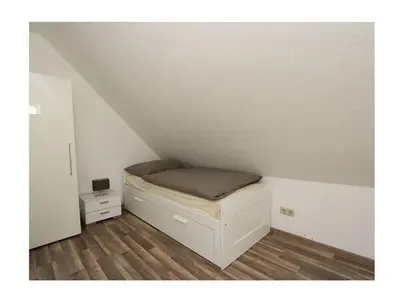 Ein Bett oder Betten in einem Zimmer der Unterkunft ToNi`s Kegelrobbe