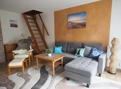 Ein Sitzbereich in der Unterkunft Ferienhaus Gänseblümchen