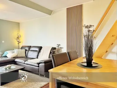 Ein Sitzbereich in der Unterkunft De Swolk Nordseeblick vom Balkon