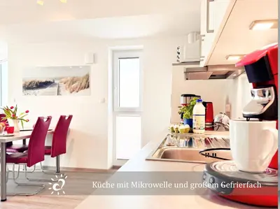 Küche/Küchenzeile in der Unterkunft Penthouse de Ool Blick auf das Wattenmeer