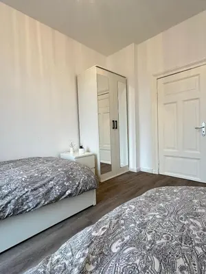 Ein Bett oder Betten in einem Zimmer der Unterkunft Apartments Brunsbüttel 2