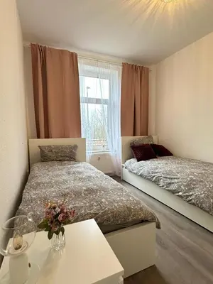 Ein Bett oder Betten in einem Zimmer der Unterkunft Apartments Brunsbüttel 2