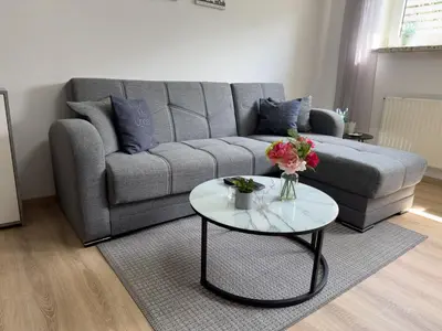 Ein Sitzbereich in der Unterkunft Haus Sonneneck Souterrain Wohnung 4