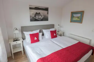 Ein Bett oder Betten in einem Zimmer der Unterkunft Boardinghouse
