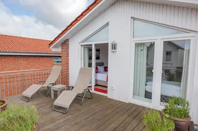 Ein Patio oder anderer Außenbereich in der Unterkunft Boardinghouse