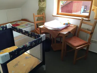 Ein Bett oder Betten in einem Zimmer der Unterkunft Ferienhaus Uferweg