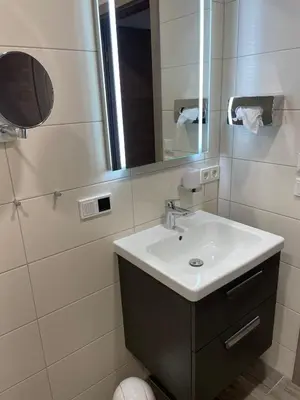Ein Badezimmer in der Unterkunft Gästehaus Janßen
