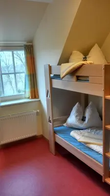 Ein Bett oder Betten in einem Zimmer der Unterkunft Jugendherberge Otterndorf