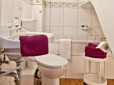 Ein Badezimmer in der Unterkunft Hotel Villa Caldera