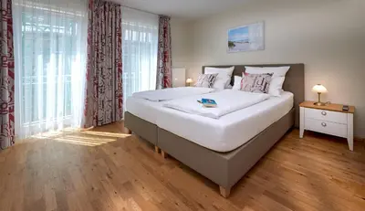 Ein Bett oder Betten in einem Zimmer der Unterkunft Haus EbenEzer