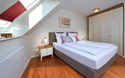 Ein Bett oder Betten in einem Zimmer der Unterkunft Haus EbenEzer