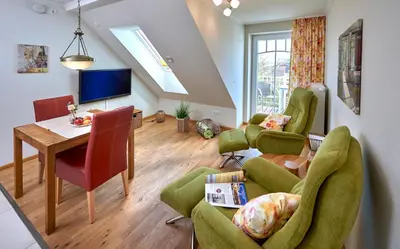 Ein Sitzbereich in der Unterkunft Haus EbenEzer