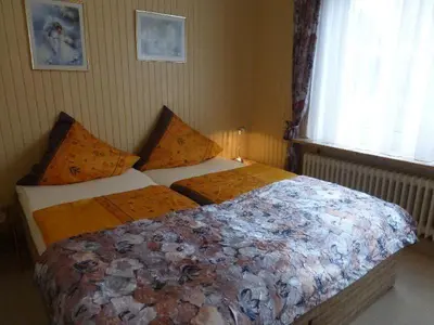 Ein Bett oder Betten in einem Zimmer der Unterkunft Ferienwohnnung Westerwarft