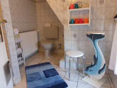 Ein Badezimmer in der Unterkunft westerwarft 10