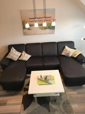 Ein Sitzbereich in der Unterkunft Ferienwohnung 307 - mit seitlichem Meerblick