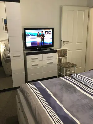 Ein Bett oder Betten in einem Zimmer der Unterkunft Strandresidenz Rosengarten - Wohnung Nr. 108