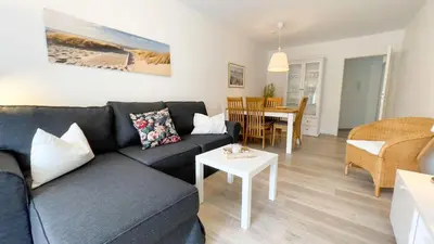 Ein Sitzbereich in der Unterkunft Strandhaus Nordseebrandung Fewo B2.1
