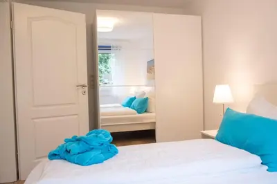 Ein Bett oder Betten in einem Zimmer der Unterkunft Haus Kirsten, Fewo Nr. 1