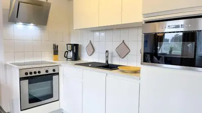 Küche/Küchenzeile in der Unterkunft Strandhaus Nordseebrandung Fewo B1.2