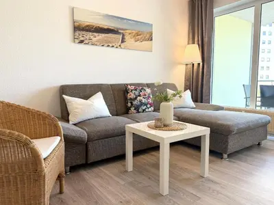 Ein Sitzbereich in der Unterkunft Strandhaus Nordseebrandung Fewo C1.1