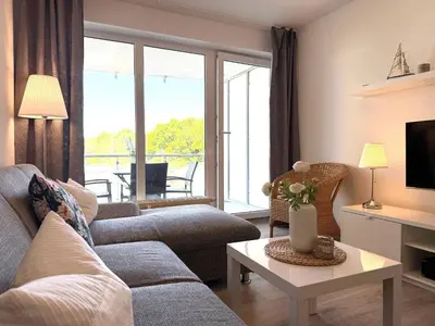 Ein Sitzbereich in der Unterkunft Strandhaus Nordseebrandung Fewo C1.1