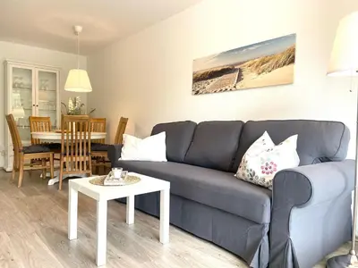 Ein Sitzbereich in der Unterkunft Strandhaus Nordseebrandung Fewo A1.1