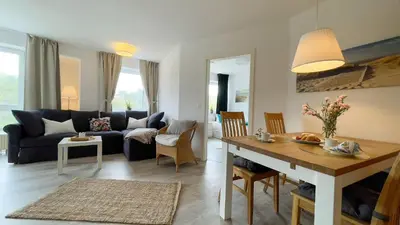 Ein Sitzbereich in der Unterkunft Strandhaus Nordseebrandung Fewo B1.3