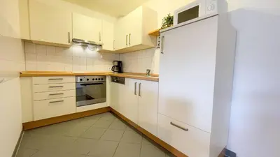Küche/Küchenzeile in der Unterkunft Strandhaus Nordseebrandung Fewo B1.3