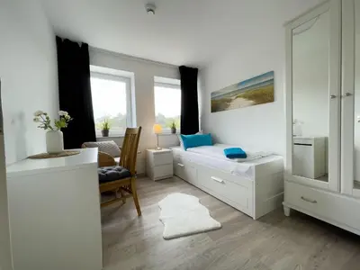 Ein Sitzbereich in der Unterkunft Strandhaus Nordseebrandung Fewo B1.3