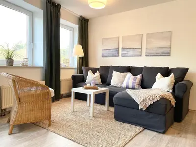 Ein Sitzbereich in der Unterkunft Strandhaus Nordseebrandung Fewo A2.2