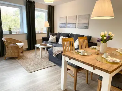 Ein Sitzbereich in der Unterkunft Strandhaus Nordseebrandung Fewo A2.2