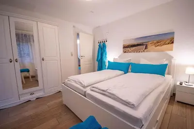 Ein Bett oder Betten in einem Zimmer der Unterkunft Haus Kirsten, Fewo Nr. 2