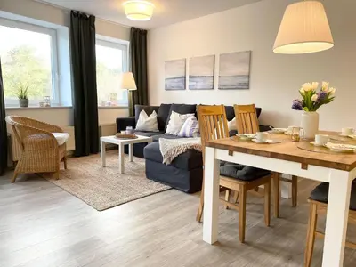 Ein Sitzbereich in der Unterkunft Strandhaus Nordseebrandung Fewo A1.2