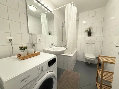 Ein Badezimmer in der Unterkunft Strandhaus Nordseebrandung Fewo B2.3