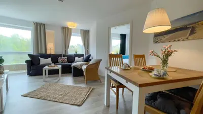 Ein Sitzbereich in der Unterkunft Strandhaus Nordseebrandung Fewo B2.3