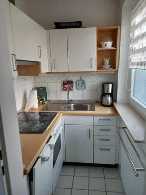 Küche/Küchenzeile in der Unterkunft Ferienwohnung Möwenschiss - Haus Bake