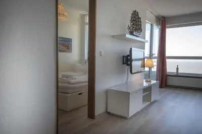 Ein Bett oder Betten in einem Zimmer der Unterkunft Frische Brise 15.09