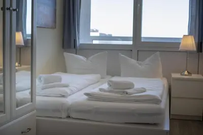 Ein Bett oder Betten in einem Zimmer der Unterkunft Frische Brise 15.09