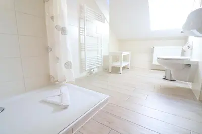 Ein Badezimmer in der Unterkunft Haus Inge