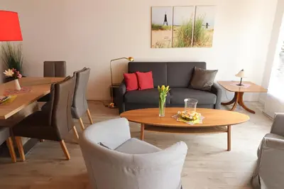 Ein Sitzbereich in der Unterkunft Haus Inge