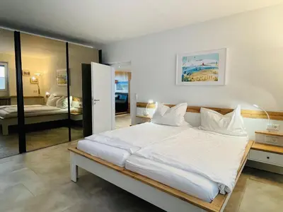 Ein Bett oder Betten in einem Zimmer der Unterkunft Haus Seehund 15