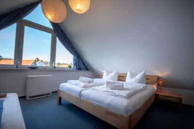 Ein Bett oder Betten in einem Zimmer der Unterkunft Hamburger Straße 7 OG