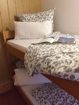Ein Bett oder Betten in einem Zimmer der Unterkunft Haus an der Südsee