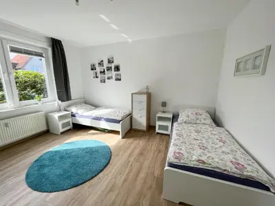 Ein Bett oder Betten in einem Zimmer der Unterkunft Appartementhaus Nige Ooge Ferienwohnung Nr. 1