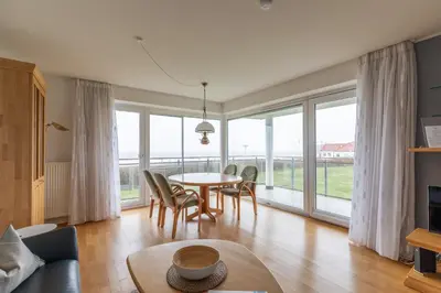 Ein Sitzbereich in der Unterkunft Strandpalais, Whg 02