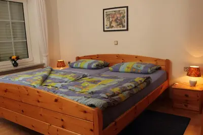 Ein Bett oder Betten in einem Zimmer der Unterkunft Ferienhof Lafrenz
