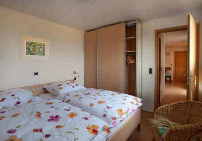 Ein Bett oder Betten in einem Zimmer der Unterkunft Erlebnishof Katthusen