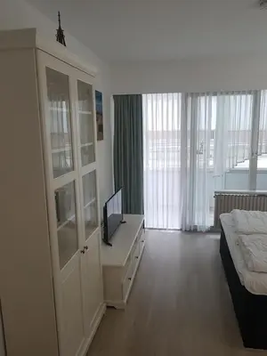 Ein Bett oder Betten in einem Zimmer der Unterkunft Gemütliches Apartment direkt am Strand